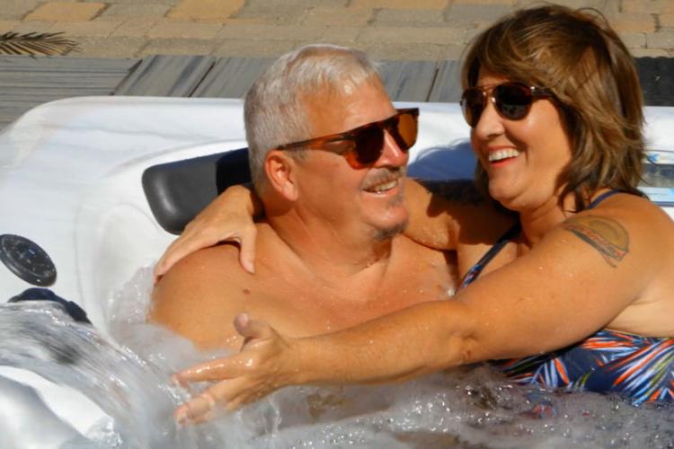 Hot Tub couple smiling
